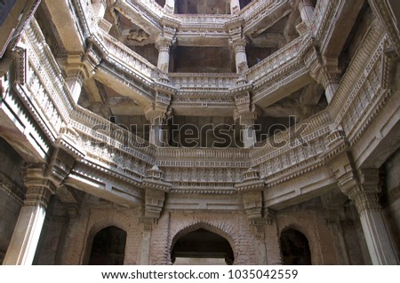 Inner view of Adalaj Ni Vav (Stepwell) or Rudabai Stepwell. Built in 1498 by Rana Veer Singh is five stories deep. Ahmedabad, Gujarat, India Royalty-Free Stock Photo #1035042559