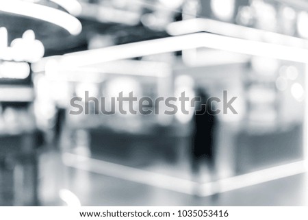 Abstract blur shopping mall interior and retail store for background in B&W color
