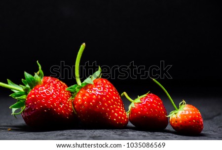 Strawberry, beautiful black background.
