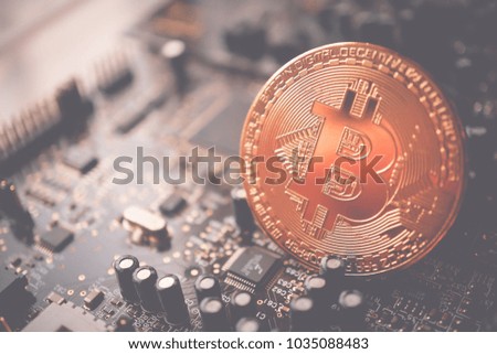 bitcoin digital money on circuits and blank space for finance and backing online concept background
