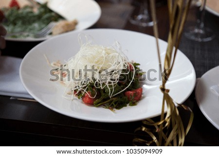 a plate of spaghetti and vegetables