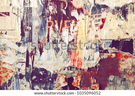 Vintage Billboard With Torn Poster, Paper, Ads, Stickers. Grungy Dingy Backdrop Or Faded Texture. Abstract Grunge Horizontal Background. Urban Creative Creased Grungy Wallpaper Or Design Element.