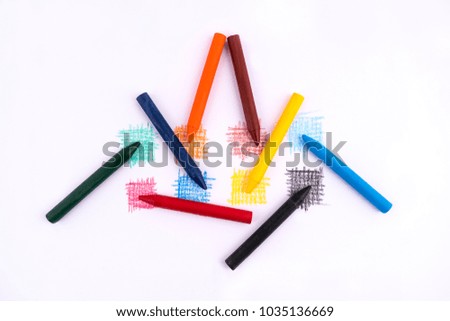 the colored scribbles made with wax crayons