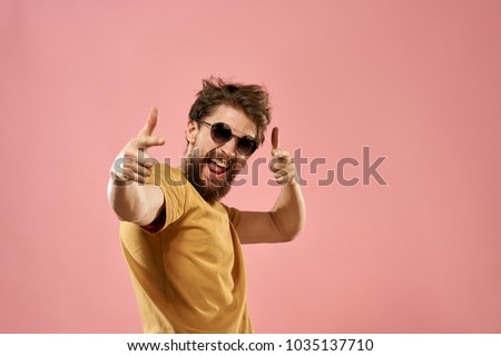  shaggy man in sunglasses, t-shirt                              