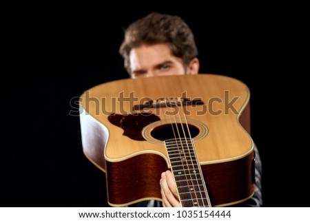 man with guitar, strings                              