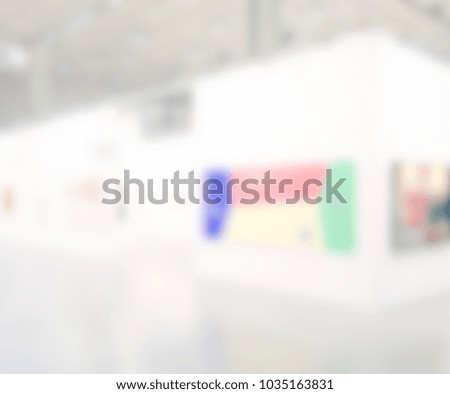 View of a trade show location. Background with an intentional blur effect applied.