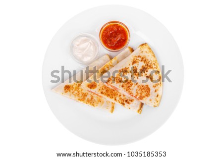 Quesadilla with chicken and tomatoes, two sauces from tomatoes and sour cream. isolated white. View from above Royalty-Free Stock Photo #1035185353