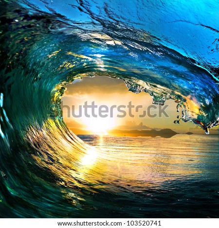 rough colored ocean wave falling down at sunset time Royalty-Free Stock Photo #103520741