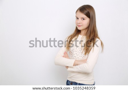 Studio image of lovely emotional caucasian teen girl