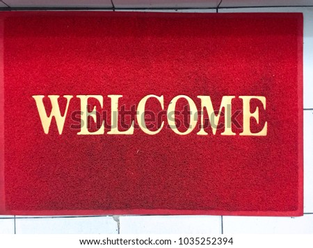 welcome on red doormat,red carpet,house concept 