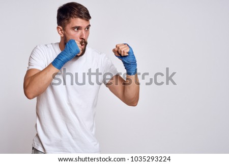  boxer with protection on hands, gym                              