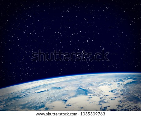 Earth and stars. The elements of this image furnished by NASA.