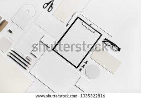 Photo of blank stationery set on paper background. Corporate identity mockup. Responsive design template. Flat lay.
