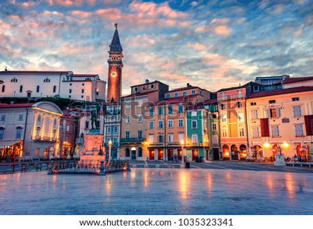 Spectacular evening view of Tartini Square in old town Piran. Splendid spring sunset in Slovenia, Europe. Traveling concept background. Beautiful Mediterranean cityscape. Royalty-Free Stock Photo #1035323341