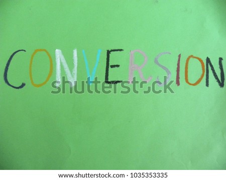Text Conversion hand written by colorful oil pastels on green color paper