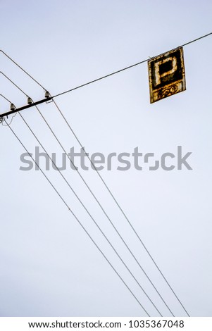 Traffic sign on the wire.