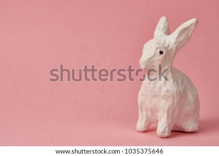  white hare on a pink background, easter                              