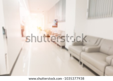 Blurred photo of clinic or hospital corridor interior background.Abstract blur beautiful luxury hospital and clinic interior for background.