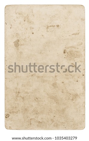 Vintage torn cardboard. Used paper sheet isolated on white background