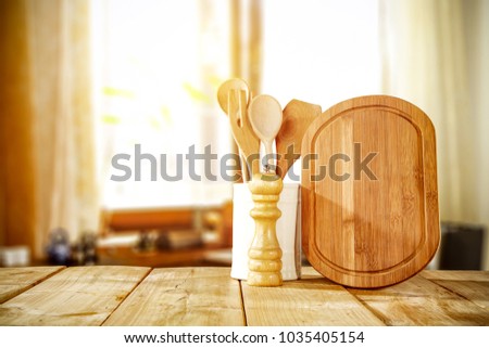 Table background in kitchen and blurred background of window space 