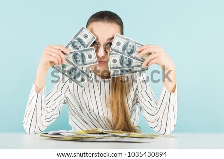 Attractive woman with cash