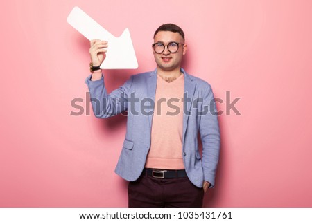 Handsome man in bright jacket with speech pointer