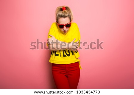 Blonde woman in bright clothes