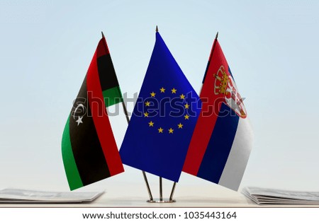 Flags of Libya European Union and Serbia
