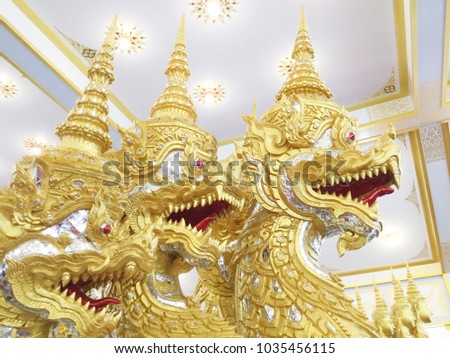 Thai carving great naga in beautiful gold color.