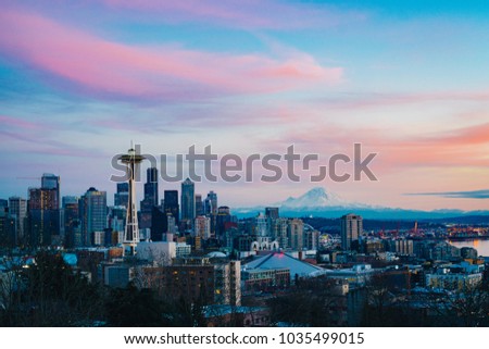 Twilight view of downtown Seattle skyline and Mt. Rainier