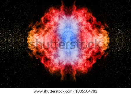 Abstract multicolored dust explosion on black background. Abstract color powder splattered  on dark background.