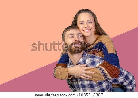 Cheerful young couple standing 