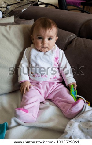 infant sit on sofa