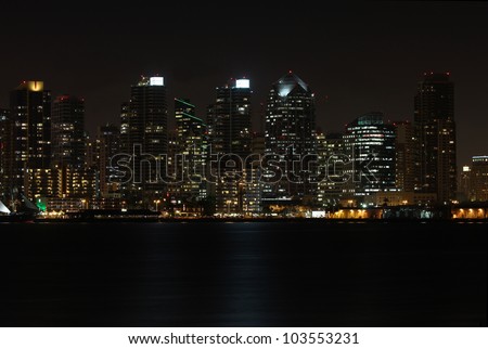 View of a partial skyline of San Diego, California from the water at night