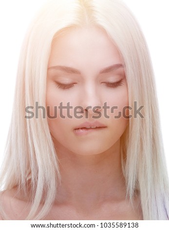 Portrait of worried beautiful young woman