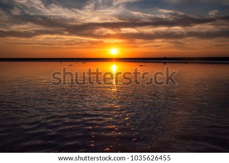 colorful sunset on a salt lake