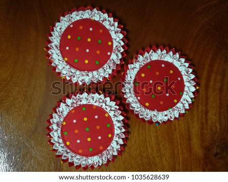 Beautiful  red Coaster flowers.Made of fabric in the form of flowers.