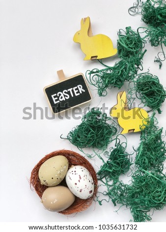 easter wallpaper with space for your text and logo. rustic easter. yellow easter feathers. easter flatlay