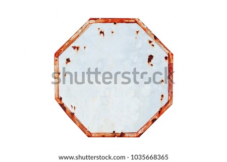 Rusty and grungy white and red old road empty traffic sign in octagon shape weathered under the elements  and isolated on a white background with clear copy space for text.
