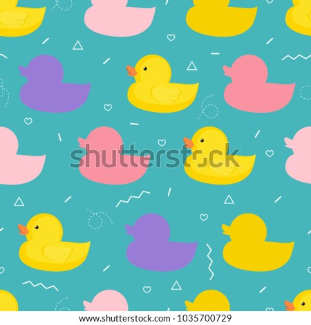Vector illustration. Seamless vector pattern with a rubber duck on a blue background. Colored ducks.
