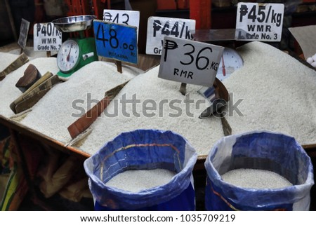 Stall selling several Filipino white rice varieties of different prices in its location at the ground floor of the Central Public Market. Bacolod city-Negros Occidental-Western Visayas-Philippines.