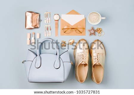 Set of Feminine accessories  with handbag, watch, note and beauty products. Royalty-Free Stock Photo #1035727831