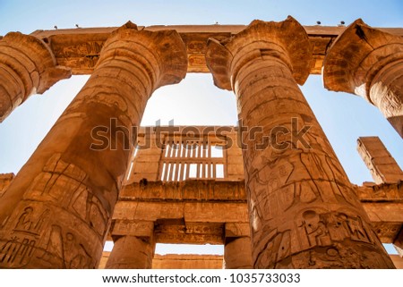 Great hypostyle hall at Temples of Karnak in Luxor Royalty-Free Stock Photo #1035733033