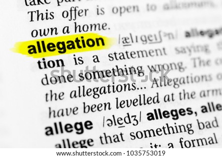 Highlighted English word "allegation" and its definition in the dictionary. Royalty-Free Stock Photo #1035753019