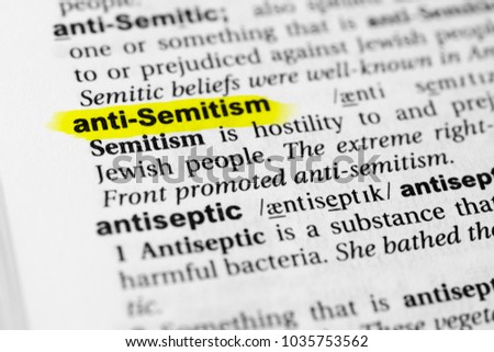 Highlighted English word "anti semitism" and its definition in the dictionary. Royalty-Free Stock Photo #1035753562