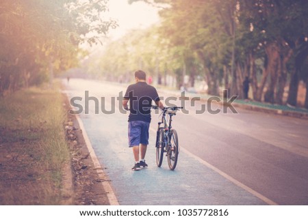 
People are exercising by cycling.