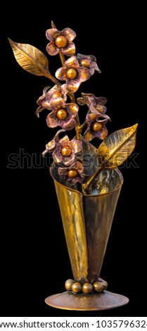 Forged bouquet of flowers in a metallic vase, golden in color, isolated on a homogeneous background