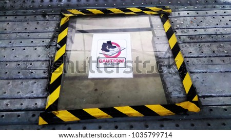 Danger sign for hole at work place. Safety in workplace. Fragile Roof.