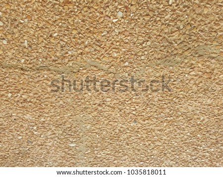 The background is made of brown marble with pattern.