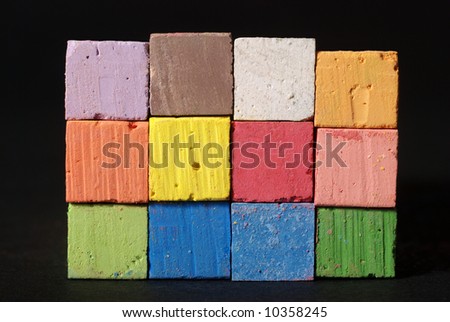 Heap of colorful chalks in close up